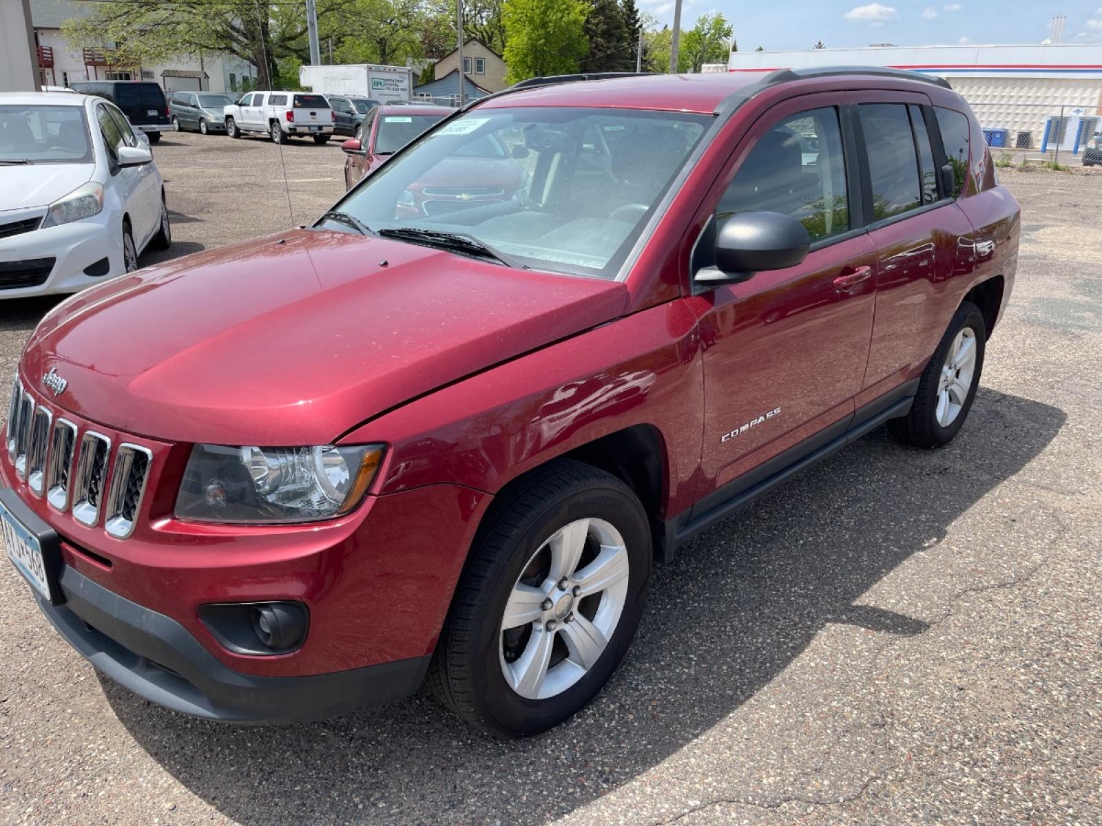 2016 Jeep Compass Sport 4WD (1C4NJDBB8GD) with an 2.4L L4 DOHC 16V engine, AUTOMATIC transmission, located at 434 West Main Street, Anoka, MN, 55303, (763) 576-9696, 45.201759, -93.396706 - Photo #0