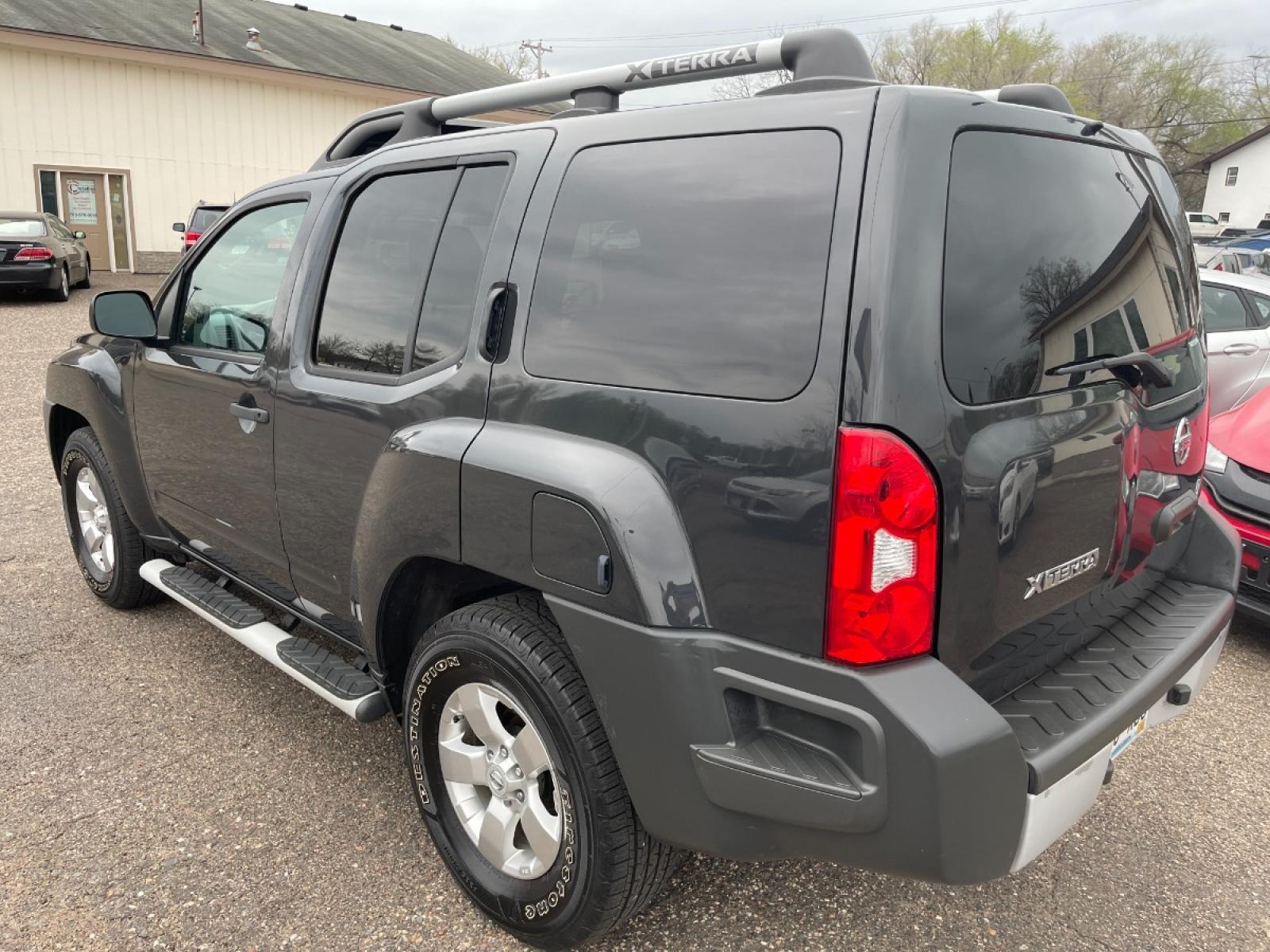 2011 Nissan Xterra S 2WD (5N1AN0NU2BC) with an 4.0L V6 DOHC 24V engine, AUTOMATIC transmission, located at 434 West Main Street, Anoka, MN, 55303, (763) 576-9696, 45.201759, -93.396706 - 2 OWNER MULTI-POINT "PERFORMANCE" INSPECTION PERFORMED: Transmission/clutch, Engine performance, Brakes, Steering, Heater/Air Conditioning, Instruments/Controls, Headlights/fog lights, Brake/back-up lights, Interior/warning lights, Turn signals/flashers MULTI-POINT "UNDER HOOD" INSPECTION PE - Photo #6