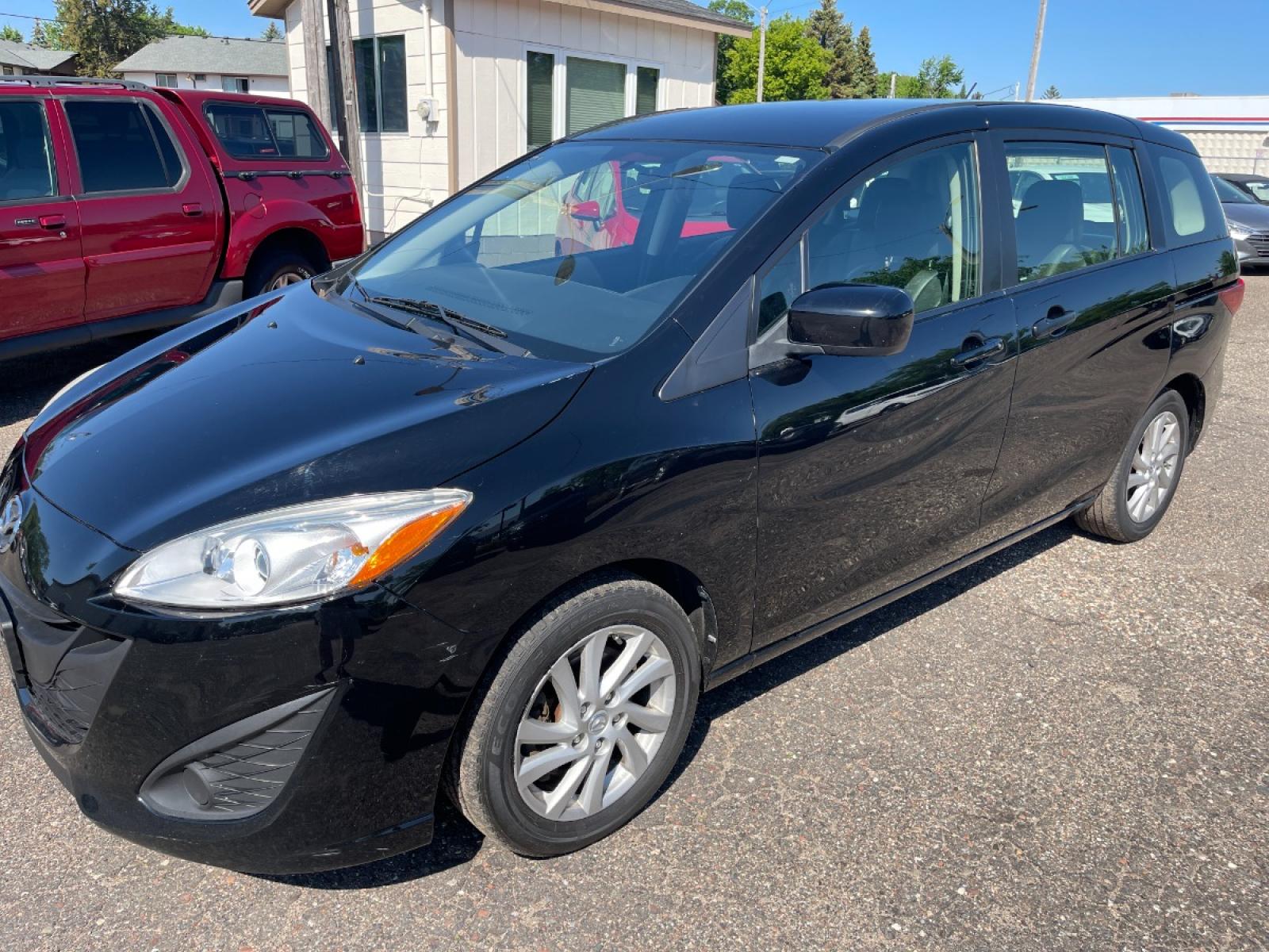2012 BLACK /BLACK Mazda MAZDA5 Sport (JM1CW2BLXC0) with an 2.5L L4 DOHC 16V engine, AUTOMATIC transmission, located at 434 West Main Street, Anoka, MN, 55303, (763) 576-9696, 45.201759, -93.396706 - MULTI-POINT "PERFORMANCE" INSPECTION PERFORMED: Transmission/clutch, Engine performance, Brakes, Steering, Heater/Air Conditioning, Instruments/Controls, Headlights/fog lights, Brake/back-up lights, Interior/warning lights, Turn signals/flashers MULTI-POINT "UNDER HOOD" INSPECTION PERFORMED : F - Photo #0