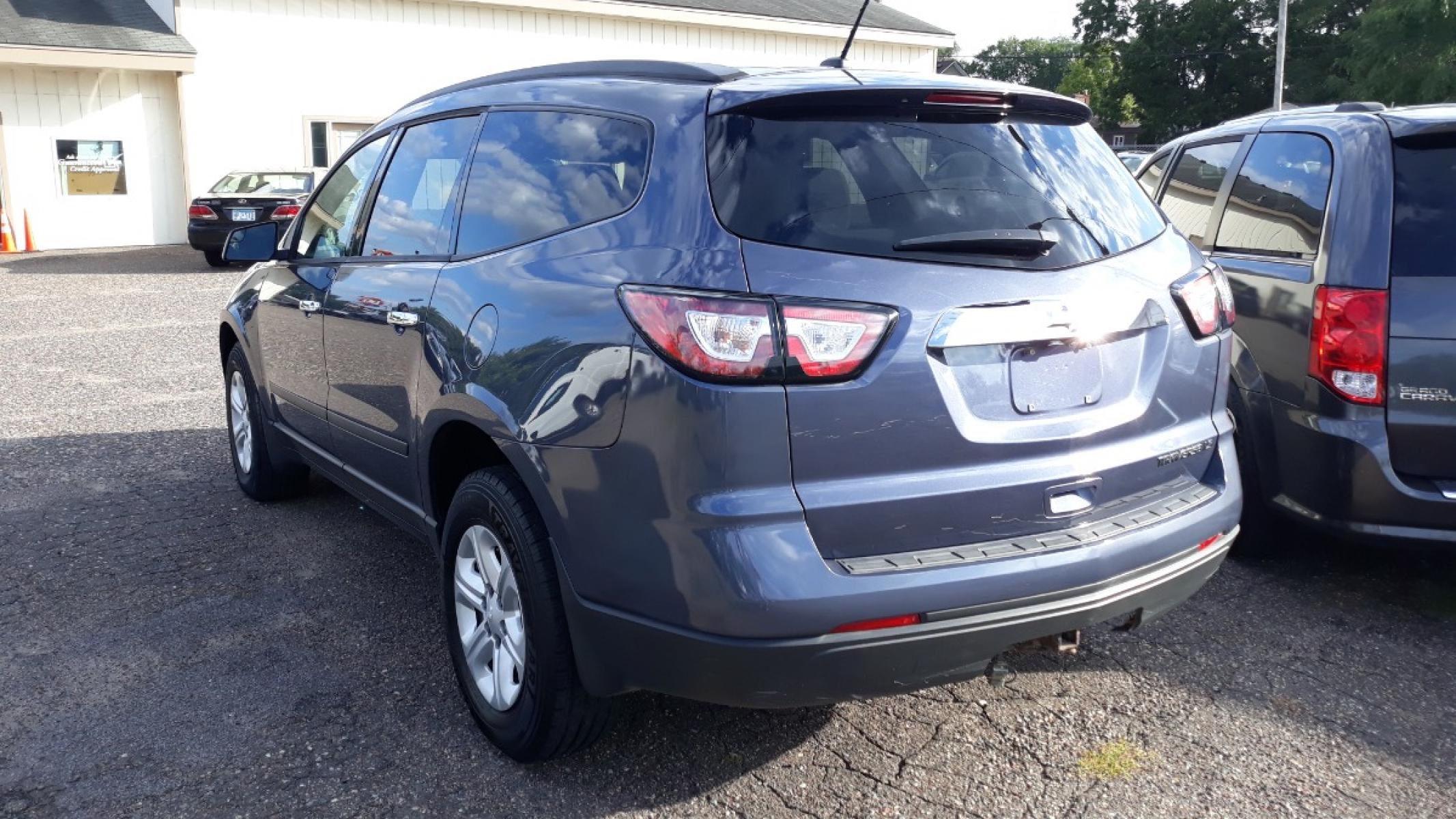 2014 Electronic Blue /GRAY Chevrolet Traverse LS FWD w/PDC (1GNKRFEDXEJ) with an 3.6L V6 DOHC 24V engine, 6-Speed Automatic transmission, located at 434 West Main Street, Anoka, MN, 55303, (763) 576-9696, 45.201759, -93.396706 - 3RD ROW SEAT!! 4 OWNER / NO ACCIDENTS MULTI-POINT 