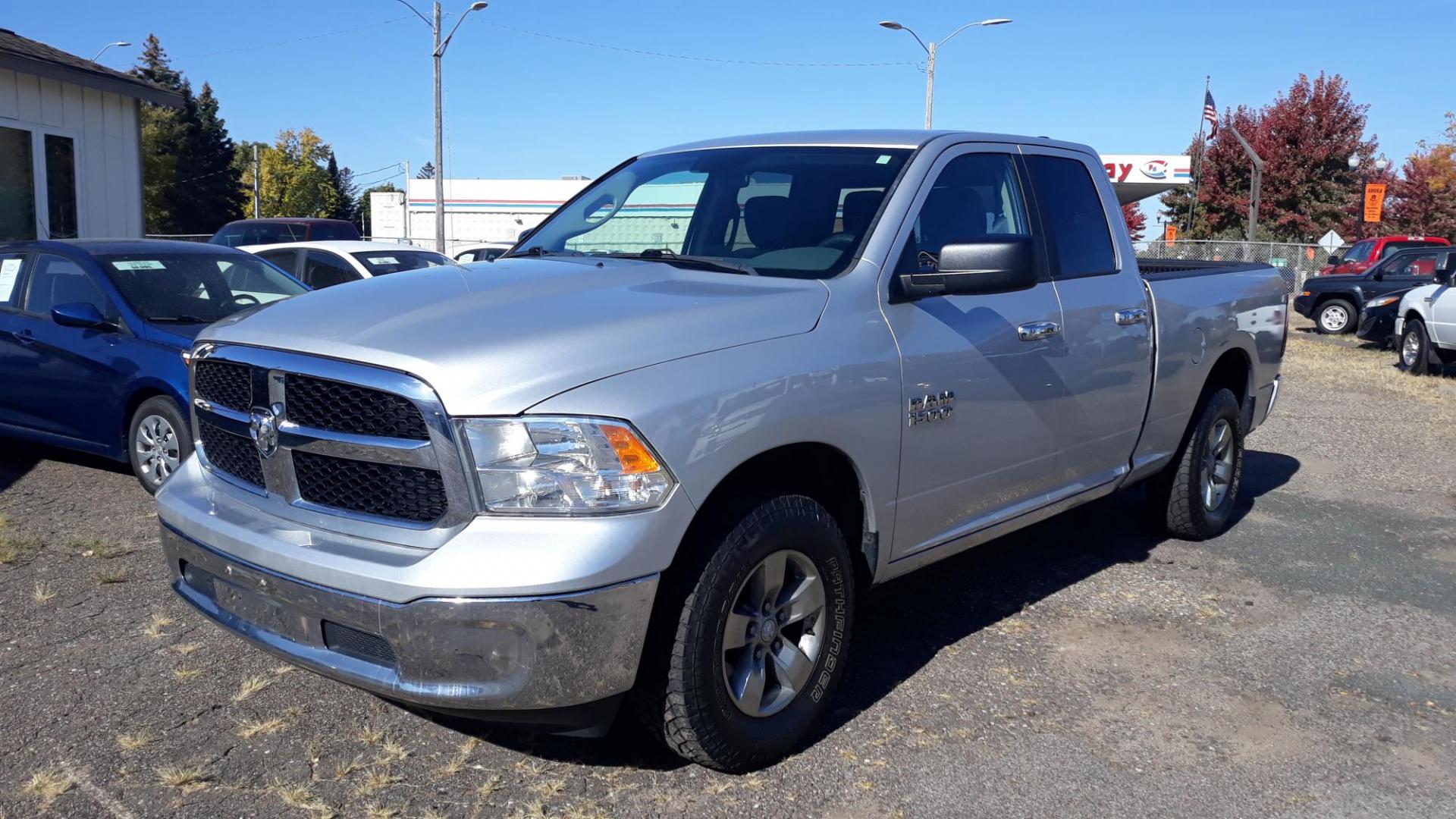 2017 SILVER /GRAY RAM 1500 SLT Quad Cab 4WD (1C6RR7GG1HS) with an 3.6L V6 DOHC 24V FFV engine, 8A transmission, located at 434 West Main Street, Anoka, MN, 55303, (763) 576-9696, 45.201759, -93.396706 - 2017 DODGE 1500 SLT 4X4, 4 DOOR 3.6 V6. SUPER CLEAN WITH POWER REAR WINDOW Air Conditioning; Power Windows; Power Locks; Power Steering; Tilt Wheel; AM/FM CD/MP3; Satellite; AM/FM CD/DVD; Sentry Key; Keyless Entry; Available; Dual Air Bags Front and Sides; Active Belts; Extended Cab; Regular Bed; A - Photo#0