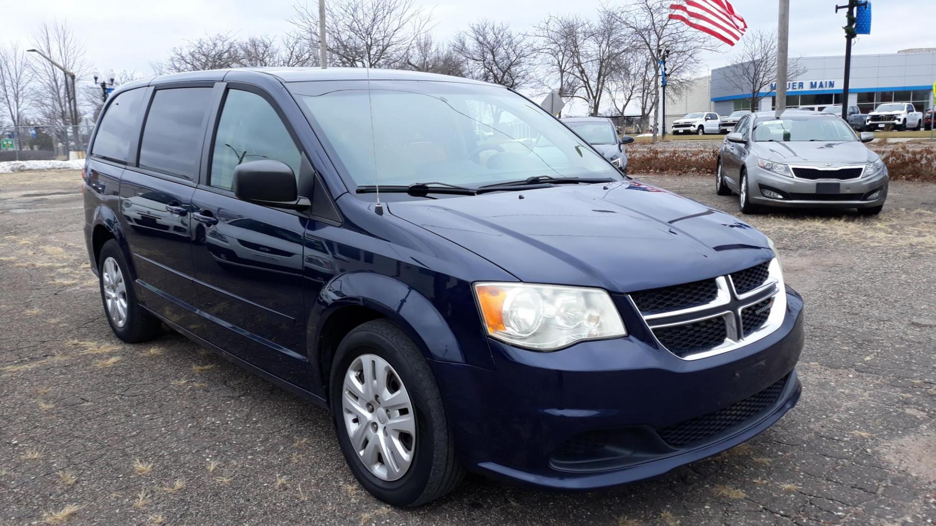 2014 Blue /TAN Dodge Grand Caravan SE (2C4RDGBG5ER) with an 3.6L V6 DOHC 24V engine, 6-Speed Automatic transmission, located at 434 West Main Street, Anoka, MN, 55303, (763) 576-9696, 45.201759, -93.396706 - 2014 DODGE GRAND CARAVAN SE, ONE OWNER, 126444 MILES, Air Conditioning; Power Windows; Power Locks; Power Steering; Tilt Wheel; AM/FM CD/MP3; Satellite; AM/FM CD/DVD; Sentry Key; Keyless Entry; Alarm; Available; Dual Front Airbags; Side Airbags; Head Airbags; Rear Head Airbags; Active Seatbelts; All - Photo#1