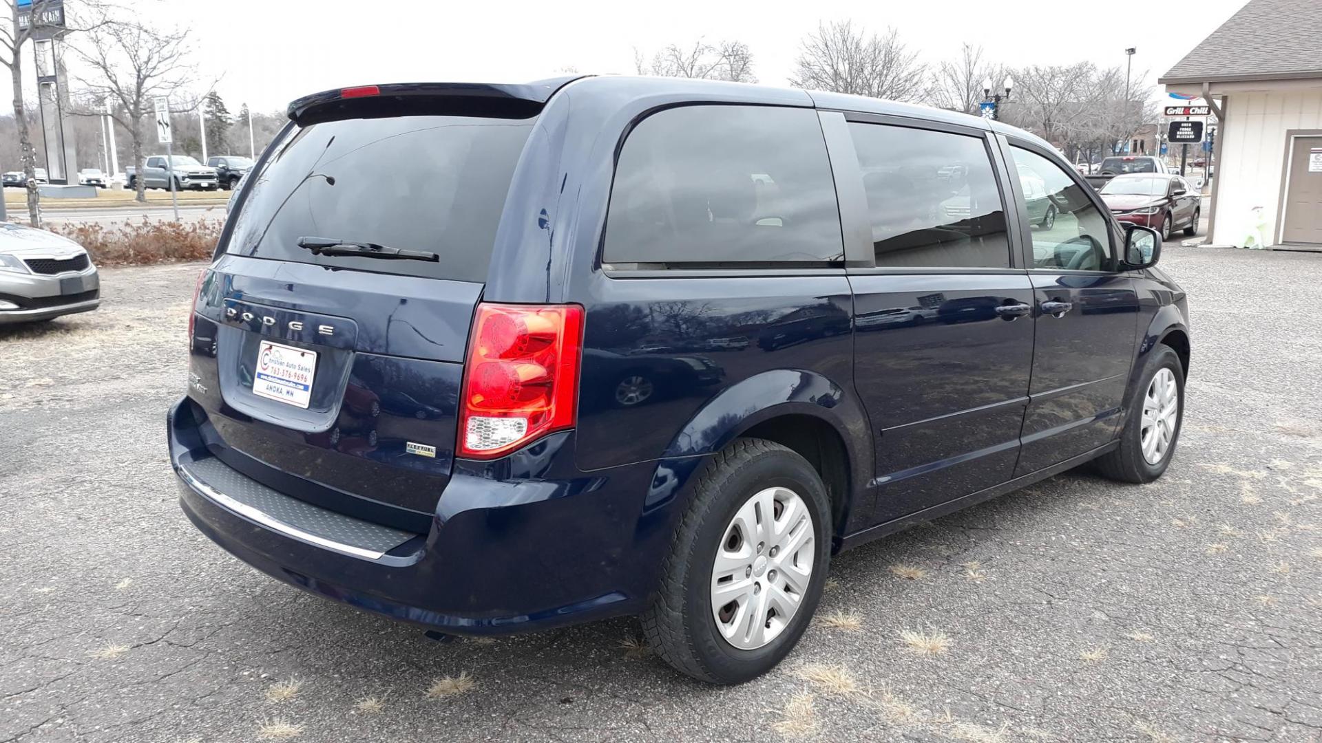 2014 Blue /TAN Dodge Grand Caravan SE (2C4RDGBG5ER) with an 3.6L V6 DOHC 24V engine, 6-Speed Automatic transmission, located at 434 West Main Street, Anoka, MN, 55303, (763) 576-9696, 45.201759, -93.396706 - 2014 DODGE GRAND CARAVAN SE, ONE OWNER, 126444 MILES, Air Conditioning; Power Windows; Power Locks; Power Steering; Tilt Wheel; AM/FM CD/MP3; Satellite; AM/FM CD/DVD; Sentry Key; Keyless Entry; Alarm; Available; Dual Front Airbags; Side Airbags; Head Airbags; Rear Head Airbags; Active Seatbelts; All - Photo#4