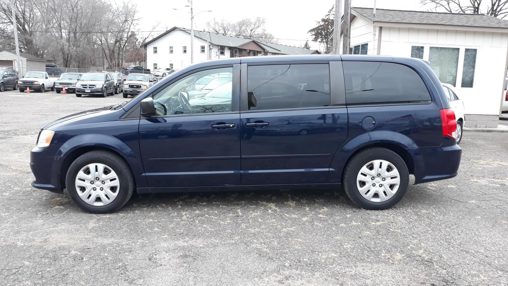 2014 Blue /TAN Dodge Grand Caravan SE (2C4RDGBG5ER) with an 3.6L V6 DOHC 24V engine, 6-Speed Automatic transmission, located at 434 West Main Street, Anoka, MN, 55303, (763) 576-9696, 45.201759, -93.396706 - 2014 DODGE GRAND CARAVAN SE, ONE OWNER, 126444 MILES, Air Conditioning; Power Windows; Power Locks; Power Steering; Tilt Wheel; AM/FM CD/MP3; Satellite; AM/FM CD/DVD; Sentry Key; Keyless Entry; Alarm; Available; Dual Front Airbags; Side Airbags; Head Airbags; Rear Head Airbags; Active Seatbelts; All - Photo#6